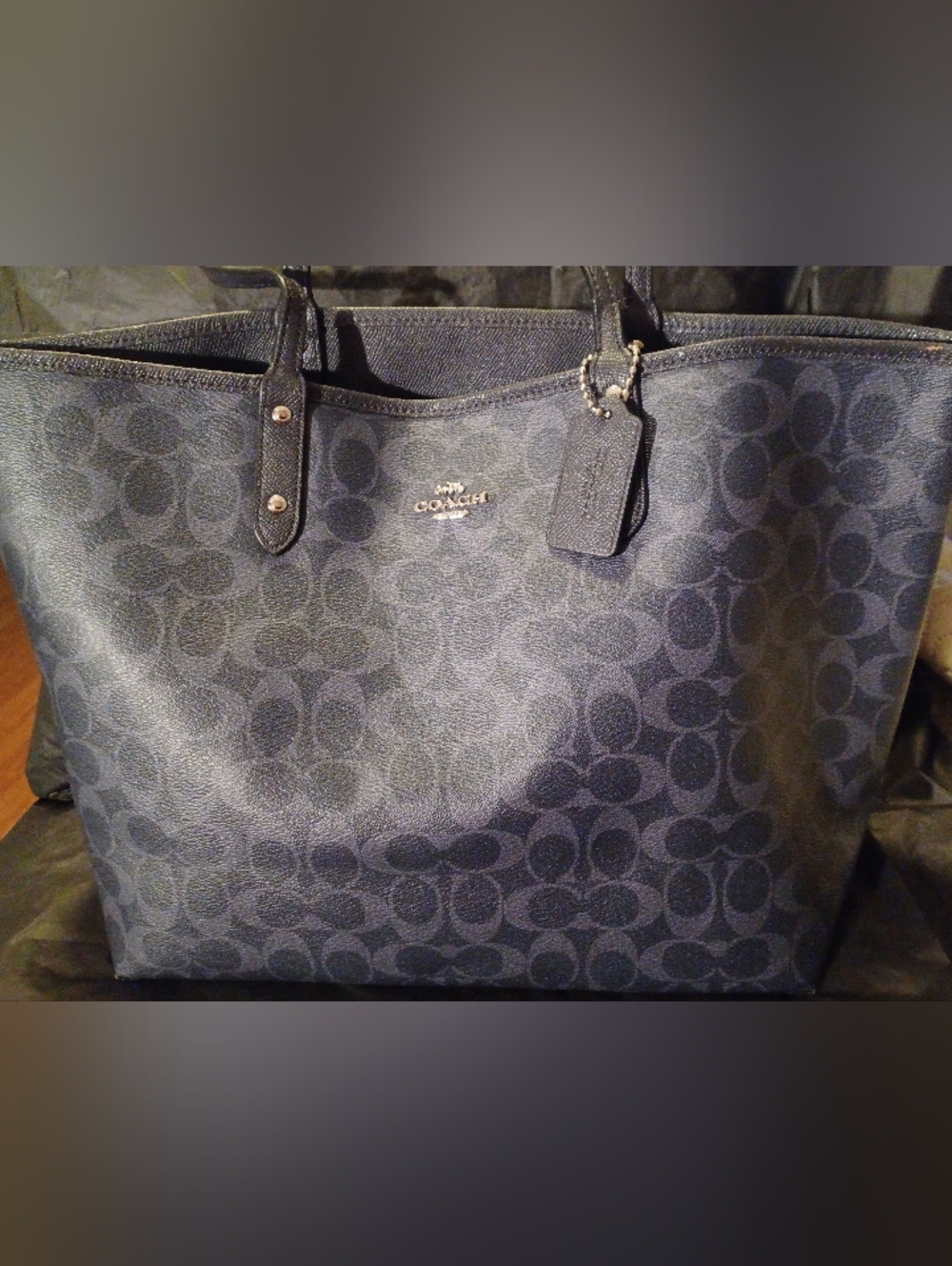 Coach midnight blue Signature coated canvas reversible city tote.